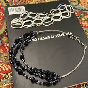 One silver necklace and 1 blue bead necklaces